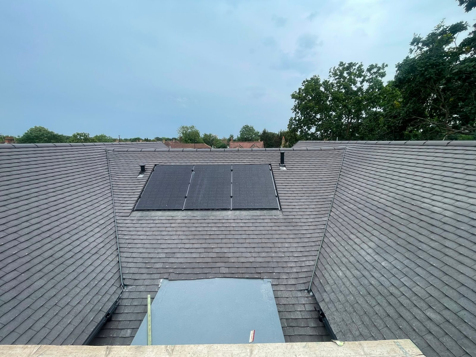 Completed Tiled Roof with Solar Panels by B KARAN BUILD ROOFING Ltd
